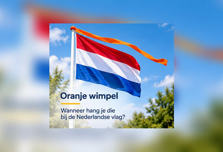 Nederlandse vlag met oranje wimpel op Koningsdag